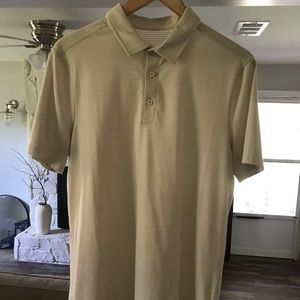 Cream colored medium Lululemon Evolution Polo